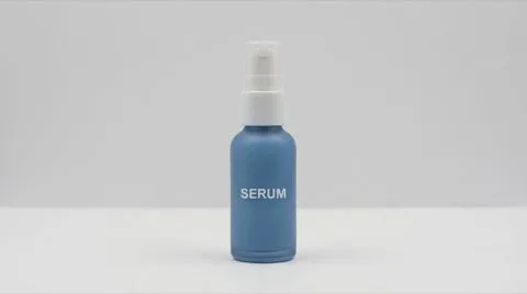 A plain blue serum bottle labelled SERUM against a grey background, a generic image from a general AI tool